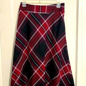 Mid length red and black plaid skirt